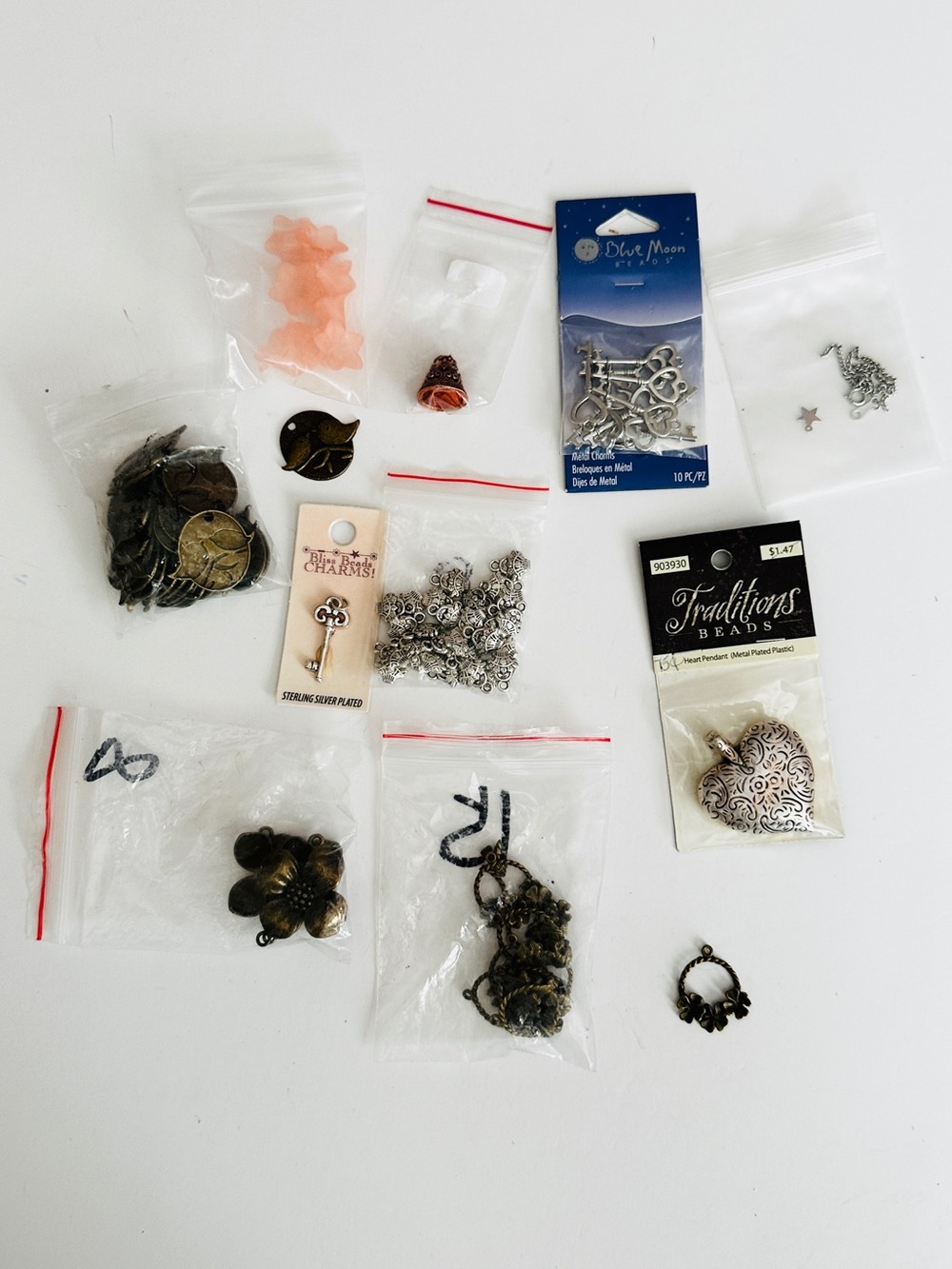 Lot #18 Mixed Jewelry Findings and Charms - Silver & Antique Brass Tones